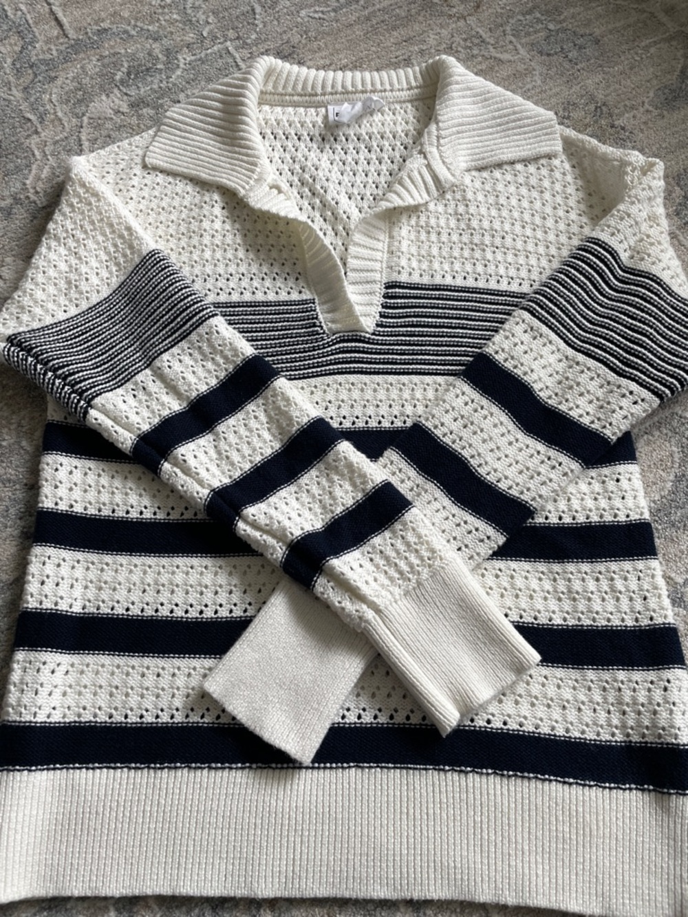 For the Republic navy and ivory sweater size Medium sailing